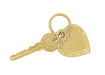 Puffed Heart and Key to Success and Love Vintage Charm in 14 Karat Yellow Gold