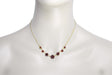 Victorian Bohemian Garnet Flowers Crescent Necklace in Sterling Silver with Yellow Gold Vermeil