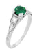 Art Deco Geometric Emerald Engagement Ring in Platinum with Side Diamonds