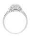 Filigree Scrolls Engraved White Sapphire Engagement Ring in Platinum