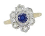 Mid Century Antique Floral Diamond and Blue Sapphire Ring in 14 Karat White and Yellow Gold