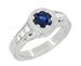 Art Deco Filigree Flowers and Scrolls Engraved Blue Sapphire and Diamond Engagement Ring in 18 Karat White Gold
