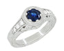 Art Deco Filigree Flowers and Scrolls Engraved Blue Sapphire and Diamond Engagement Ring in 18 Karat White Gold