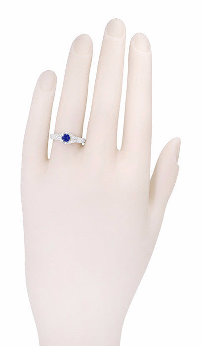 R149 - Hand Photo of Filigree Sapphire and Diamond Engagement Ring 