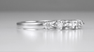 1950's Retro Moderne Platinum Starburst Galaxy Three Stone Diamond Wedding Ring