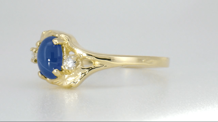 1970s Oval Blue Star Sapphire Cabochon Bypass Twist Ring in Yellow Gold with Side Diamonds - Item: R921YS - Image: 5