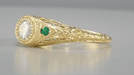 Art Deco 1920's Heirloom Filigree Diamond and Side Emerald Engagement Ring in Yellow Gold