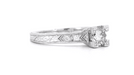 Art Deco Platinum Diamond Engagement Ring with 0.60 Carat Center Diamond in Hand Engraved Fishtail Setting