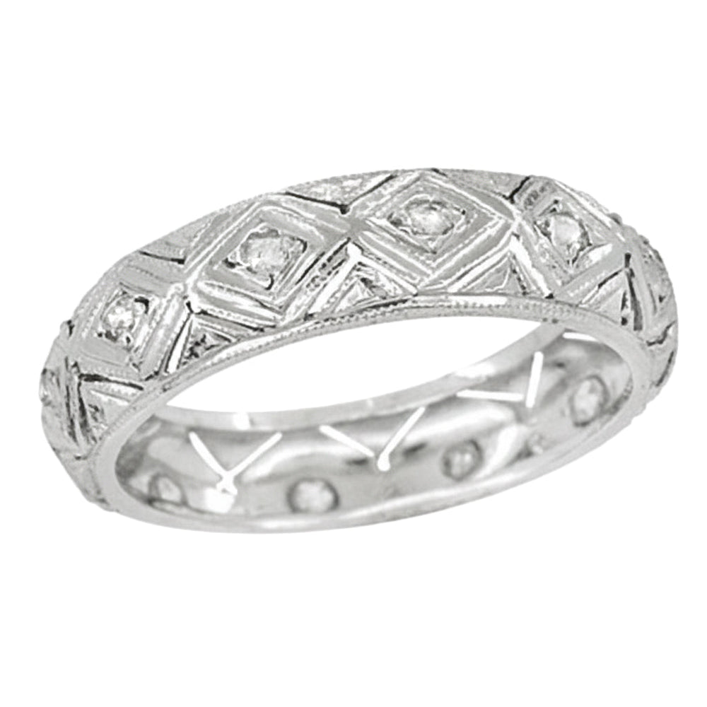 An antique Art Deco style platinum wedding ring for women with 12 old rose cut diamonds, featuring a geometric pattern with filigree work. Size 6.5, 4.8mm wide. R1105