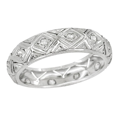 An antique Art Deco style platinum wedding ring for women with 12 old rose cut diamonds, featuring a geometric pattern with filigree work. Size 6.5, 4.8mm wide. R1105