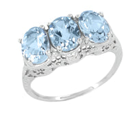 Edwardian Oval Trio Aquamarine Filigree Ring in 14 Karat White Gold