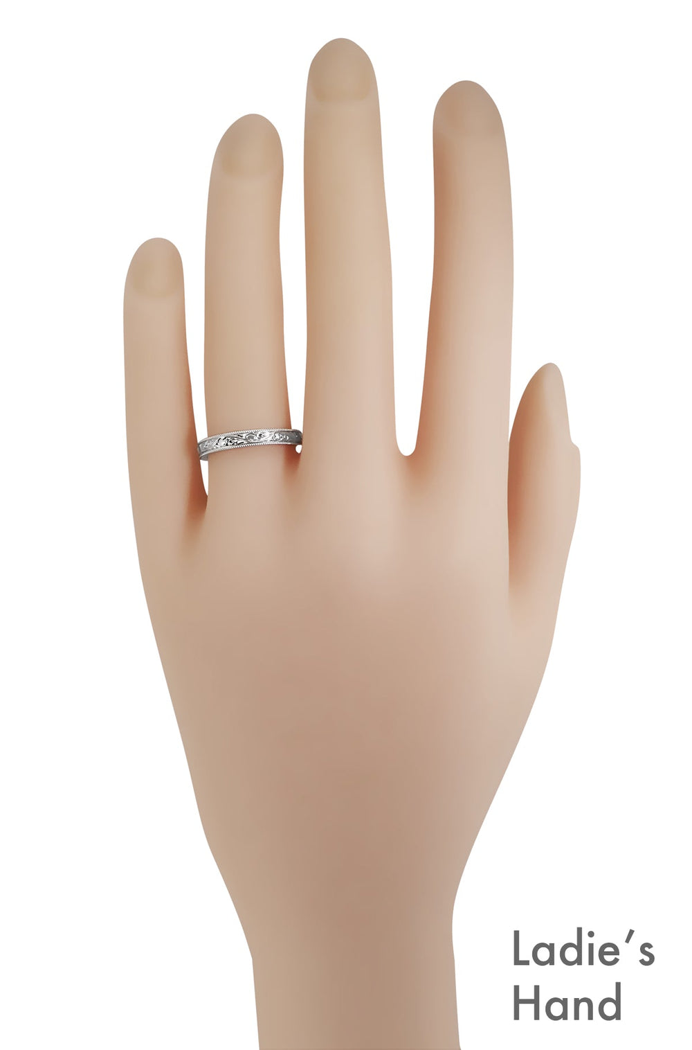 R1235P Platinum Victorian Wedding Band With Lumenesque Engraving on a Womans Hand