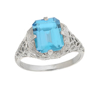 Filigree Art Deco Leaves and Flowers Emerald Cut Swiss Blue Topaz Ring in 14 Karat White Gold