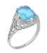 Filigree Art Deco Leaves and Flowers Emerald Cut Swiss Blue Topaz Ring in 14 Karat White Gold