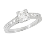 Art Deco Platinum Diamond Engagement Ring with 0.60 Carat Center Diamond in Hand Engraved Fishtail Setting
