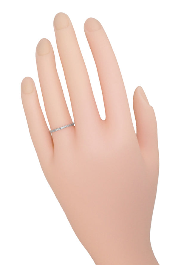 Extremely thin platinum wedding band on hand - R633P