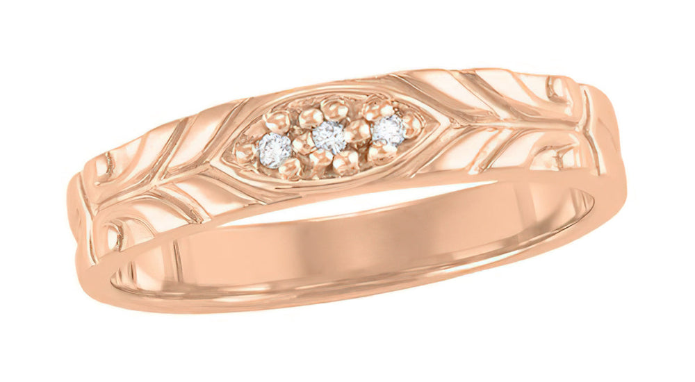 A vintage men's 14K rose gold wedding band featuring a Retro Modern carved sculptural pattern with three diamonds set in the center. - R852R
