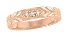 A vintage men's 14K rose gold wedding band featuring a Retro Modern carved sculptural pattern with three diamonds set in the center. - R852R