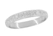 An antique white gold wedding band with a carved floral pattern and millgrain edging, 3.5mm wide. Available in 14K, 10K or 18K white gold. R853