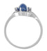 White Gold 1970s Vintage Style Oval Blue Star Sapphire Cabochon Bypass Ring with Side Diamonds