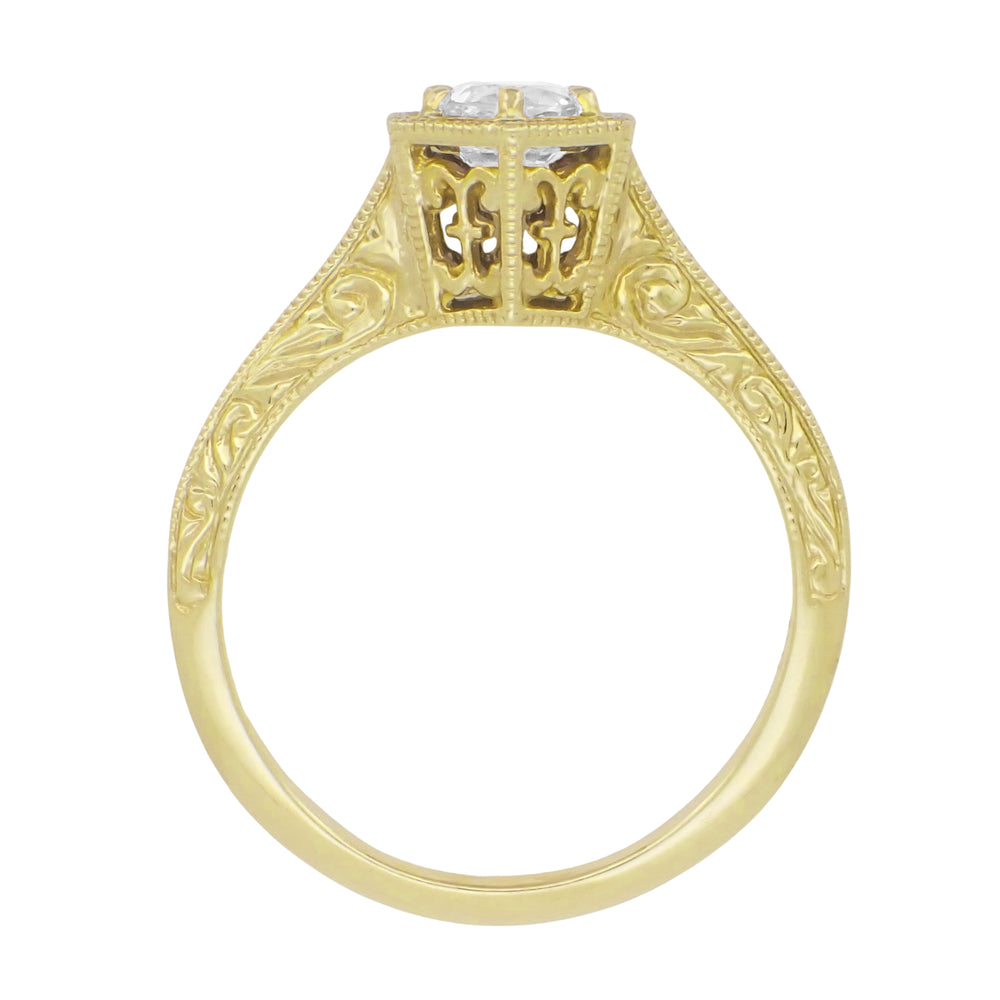A yellow gold white sapphire solitaire ring with an ornate filigree crown and a clear round white sapphire, shown in side view on a plain white background. R180Y33WS
