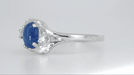 White Gold 1970s Vintage Style Oval Blue Star Sapphire Cabochon Bypass Ring with Side Diamonds