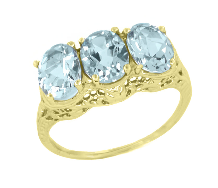 Edwardian Yellow Gold Filigree Three Stone Oval Trio Aquamarine Ring