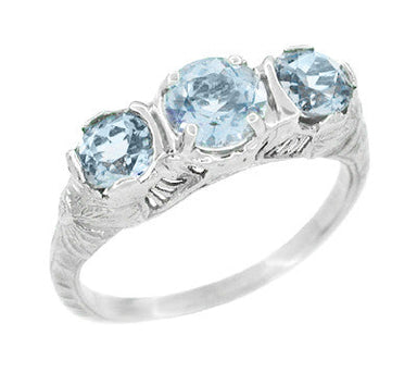 Art Deco Aquamarine Filigree Three Stone Ring in 14 Karat White Gold
