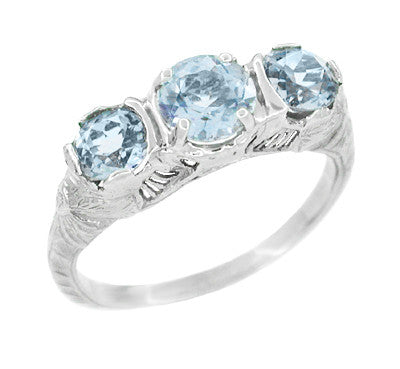 Art Deco Aquamarine Filigree Three Stone Ring in 14 Karat White Gold