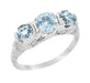 Art Deco Aquamarine Filigree Three Stone Ring in 14 Karat White Gold