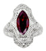 Art Deco Garnet Filigree Cocktail Ring in 14 Karat White Gold