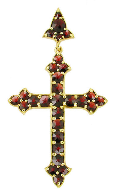 A Victorian Bohemian Garnet Gothic Cross Pendant in Sterling Silver with Yellow Gold Vermeil, featuring a cross with natural rose cut garnets. - CSS11