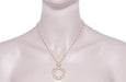 Art Deco Eternal Circle of Love Filigree Pendant Necklace in Sterling Silver with Yellow Gold Vermeil