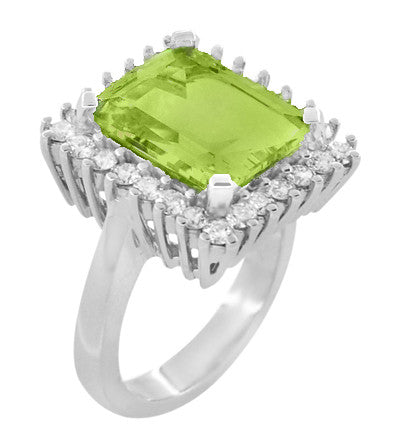 1950's Large 6.25 Carat Octagonal Vintage Peridot Ballerina Ring Framed with Side Diamonds in 18K White Gold - R1176WPER