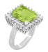 1950's Large 6.25 Carat Octagonal Vintage Peridot Ballerina Ring Framed with Side Diamonds in 18K White Gold - R1176WPER