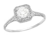 Filigree Scrolls Engraved White Sapphire Engagement Ring in Platinum