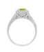 1920's Filigree Scroll Engraved Peridot Engagement Ring in 14 Karat White Gold