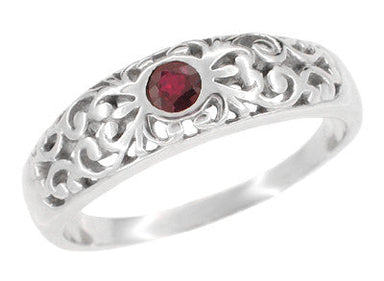 A palladium Edwardian scroll design filigree antique ruby ring with a natural round red ruby center gemstone. The ing is tapered and wider at the top of the band. - R197PDMR 