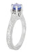 Art Deco Carved Filigree Scrolls Crown Tanzanite Solitaire Engagement Ring in 18 Karat White Gold