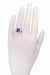 R324 Art Deco Antique Cushion Cut Amethyst Filigree Ring on a Ladie's Hand