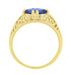 Yellow Gold Edwardian Fleur-De-Lys Filigree East to West Oval Tanzanite Ring