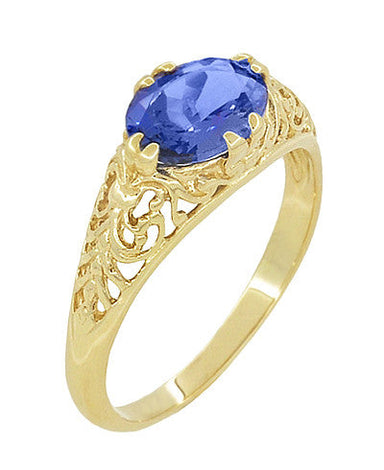 Yellow Gold Edwardian Fleur-De-Lys Filigree East to West Oval Tanzanite Ring - alternate view