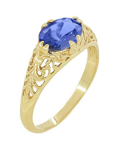 Yellow Gold Edwardian Fleur-De-Lys Filigree East to West Oval Tanzanite Ring - Item: R799YTA - Image: 2
