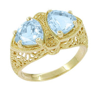 Art Deco Filigree Loving Duo Blue Topaz Ring in 14 Karat Yellow Gold - December Birthstone