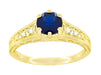 Sapphire and Diamond Filigree Engagement Ring in 14 Karat Yellow Gold