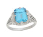 Filigree Art Deco Leaves and Flowers Emerald Cut Swiss Blue Topaz Ring in 14 Karat White Gold