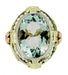 Art Deco Filigree Aquamarine Estate Ring Framed with Seed Pearls in 14 Karat Tricolor Gold