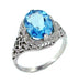 Blue Topaz Filigree Ring in 14 Karat White Gold
