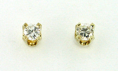 Diamond Stud Earrings in 14 Karat Gold