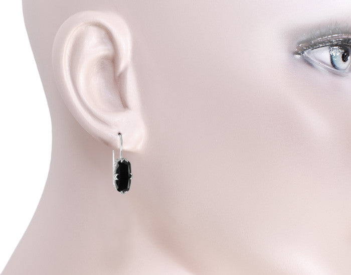 E183on Cushion Cut Vintage Onyx Earring on a Woman's Ear